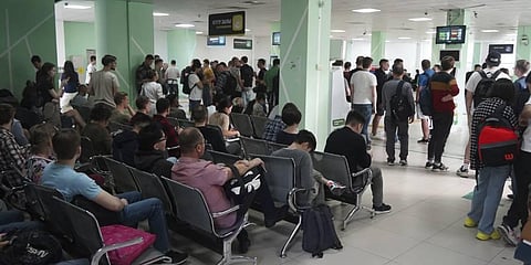 A day after President Vladimir Putin ordered a partial mobilization to bolster his troops in Ukraine, many Russians are leaving their homes. (Photo | AP)