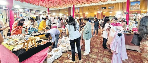 (Left and centre) Customers shopping at various stalls; (extreme right) wedding potlis displayed at a stall