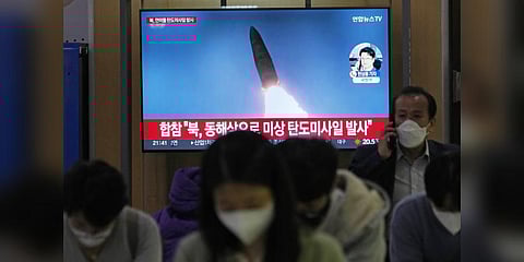 A TV screen shows a file image of North Korea's missile launch during a news program at the Seoul Railway Station in Seoul, South Korea. (Photo | AP)