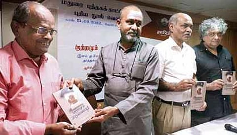 Justice GR Swaminathan releasing ‘Kutramum Karunaiyum’, authored by senior journalist V Sudharshan, in Madurai on Friday | K K Sundar