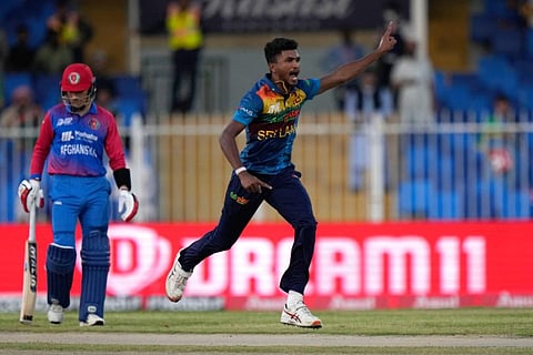 Sri Lanka's Dilshan Madushanka, center, celebrates after taking the wicket of Afghanistan's Hazratullah Zazai during the T20 cricket match of Asia Cup. (Photo | PTI)