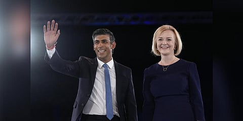 Liz Truss, right, and Rishi Sunak on stage after a Conservative leadership election hustings at Wembley Arena in London. (Photo | AP)
