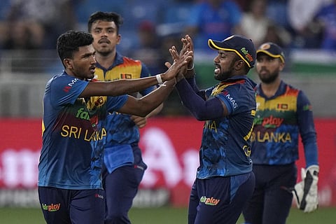 Sri Lanka's Dilshan Madushanka (L) celebrates with teammates during the T20 cricket match of Asia Cup in Dubai on Tuesday. (Photo | PTI)