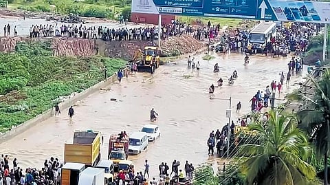 The flooded Channasandra bridge that connects Koraluru village to Bengaluru