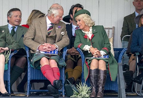 Britain's Prince Charles, foreground left and Camilla, Duchess of Cornwall speak, during the Braemar Royal Highland Gathering. (Photo | AP)