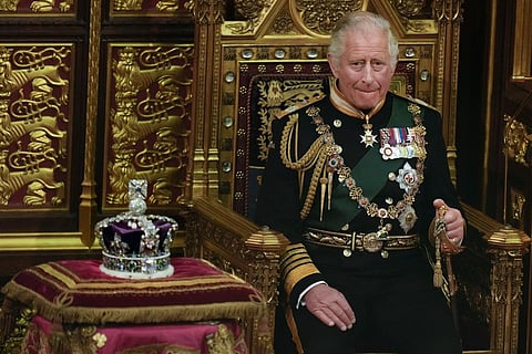 Prince Charles is seated next to the Queen's crown during the State Opening of Parliament, at the Palace of Westminster in London, May 10, 2022. (Photo | AP)