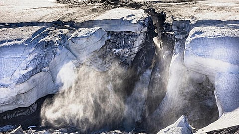 In this file photo taken on July 17, 2022, meltwater flows from the Greenland ice sheet into the Baffin Bay near Pituffik, Greenland. (Photo | AFP)