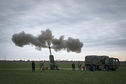 Ukrainian soldiers fire at Russian positions from a U.S.-supplied M777 howitzer in Kherson region, Ukraine, Jan. 9, 2023. (Photo | AP)