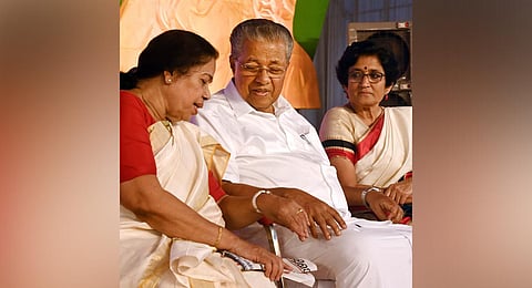 Pinarayi Vijayan having a chat with senior CPM leader and newly-elected president of AIDWA P K Sreemathy, AIDWA general secretary Mariam Dhawale is also seen.(Photo | Vincent Pulickal, EPS)