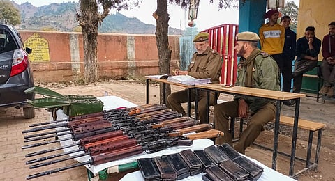Rifles are distributed to the Village Defence Committee (VDC) members after the twin terror incidents, in the Dhangri village of Rajouri (Photo | PTI)