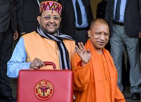 Uttar Pradesh Chief Minister Yogi Adityanath and Finance Minister Suresh Khanna. (File photo |