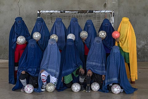 An Afghan women's soccer team poses for a photo in Kabul, Afghanistan, Thursday, Sept. 22, 2022. (Photo | AP)