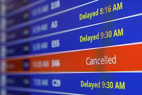 A video board shows flight delays and cancellations at Ronald Reagan Washington National Airport in Arlington, Va., Wednesday, Jan. 11, 2023. (Photo | AP)