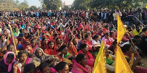 Tribals protest demanding to 'free' the Parasnath hills in Jharkhand's Giridih district from the 'clutches' of the Jain community. (Photo | PTI)