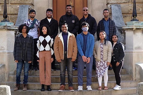 Members from the Society, outside Radcliffe Camera; (Below)Tamil Society at a food festival share Tamil cuisine with the wider Oxford community.