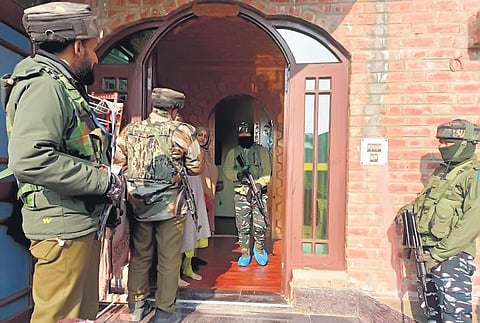 Paramilitary personnel have started using shoe covers while searching residential houses in the Valley during anti-militancy operations | Express