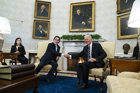President Joe Biden shakes hands with Japanese Prime Minister Fumio Kishida as they meet in the Oval Office of the White House, Friday, Jan. 13, 2023, in Washington. (Photo | AP)