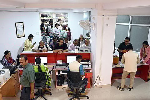 Customers throng the counter at the Evening Post Office, which opened on Museum Road in Bengaluru. (Photo | Nagaraja Gadekal, EPS)