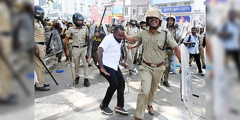 A Youth League activist being taken into custody by the police following a protest march to the Secretariat.(Photo | Vincent Pulickal)