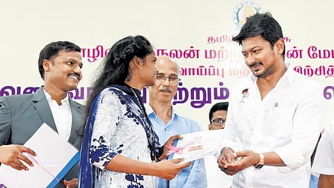 Udhanidhi Stalin distributing guides to job aspirants after inaugurating the free coaching centre for competitive examinations | R Satish Bau