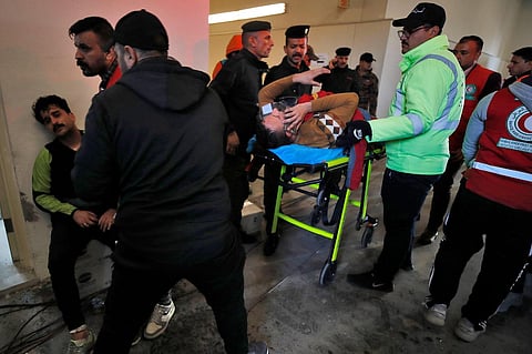 Injured football spectators in an emergency area at the Basra International Stadium following a stampede ahead of this evening's final match of the Arabian Gulf Cup in Basra. (Photo | AFP)