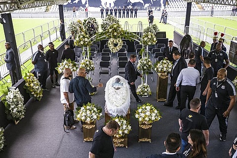 The coffin with the remains of Brazilian soccer great Pele lies on display on the pitch of the Vila Belmiro stadium in Santos, Brazil, Monday, Jan. 2, 2023. (Photo | AP)