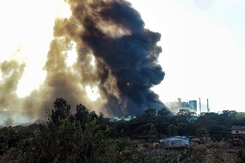 Black smoke rises after a fire broke out at a factory, at Mundegaon village in Nashik, on Jan 1, 2023. (Photo | PTI)