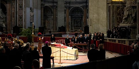 The body of late Pope Emeritus Benedict XVI laids out in state inside St. Peter's Basilica at The Vatican on Monday, January 2. (Photo | AP)