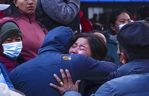 A woman cries as the body of a relative, victim of a plane crash, is brought to a hospital in Pokhara, Nepal, Sunday, Jan. 15, 2023. (Photo | AP)
