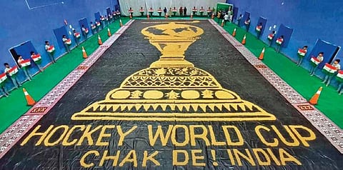 The mosaic made with husk by artist Sudarsan Patnaik | Express