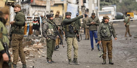 Security personnel stand guard after two blasts occurred at Narwal area in Jammu, Saturday, Jan. 21, 2023.(Photo | PTI)