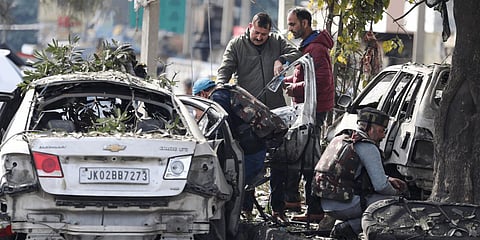Bomb Squad inspects the site after two blasts occurred at Narwal area in Jammu, Saturday, Jan. 21, 2023.(Photo | PTI)
