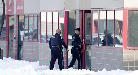 Law enforcement officers enter the Starts Right Here building, Monday, Jan. 23, 2023, in Des Moines, Iowa. (Photo | AP)