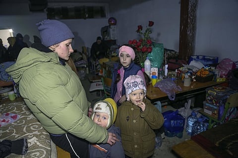 Women and children in a school bomb shelter in Ukraine. (File Photo | AP)