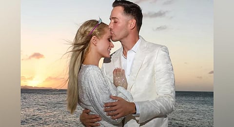 Paris Hilton and Carter Reum.