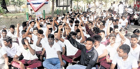 Students of YMCA College of Physical Education stage a protest demanding action against principal, and better hostel amenities in Chennai on Tuesday | r satish babu