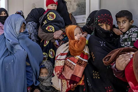 Mothers along with babies who suffer from malnutrition wait to receive help and check-up at a clinic that run by the WFP, in Kabul, Afghanistan, Thursday, Jan. 26, 2023. (Photo | AP)