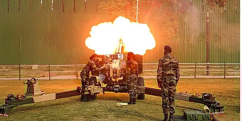 Gunners of 8711 Field Battery (Ceremonial) present the traditional 21 Gun Salute by the indigenously made 105 mm Indian Field Guns on the occasion of the Republic Day, in New Delhi | PTI