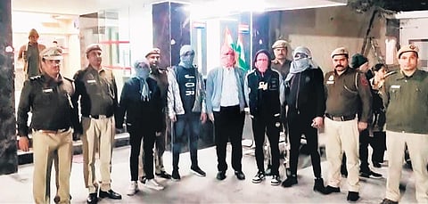 The suspects in the hit-and-drag case under police custody. (Photo | Express)