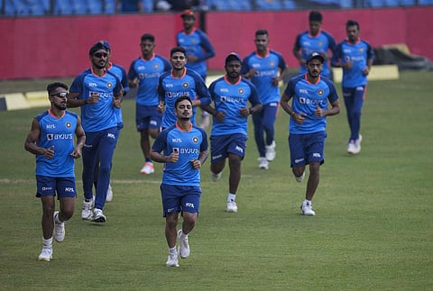 Indian players warm up during a training session ahead of the first Twenty20 cricket match between India and Sri Lanka in Mumbai. (Photo | AP)