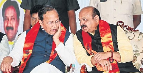 Chief Minister Basavaraj Bommai shares a word with BJP Karnataka in-charge Arun Singh during the Kshatriya convention in Bengaluru on Sunday | Shashidhar Byrappa