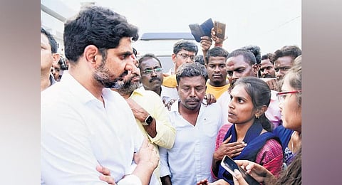 Nara Lokesh interacting with people during his walkathon on Monday I Express