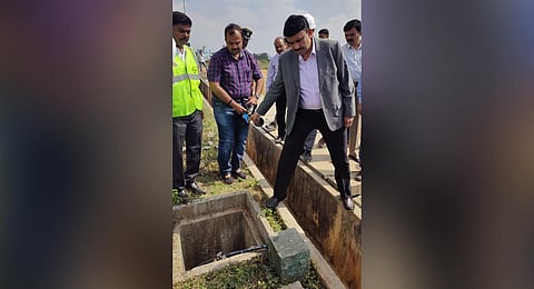 BDA Commissioner G Kumar Naik inspects the work at Nadaprabhu Kempegowda Layout. (Photo | Express)