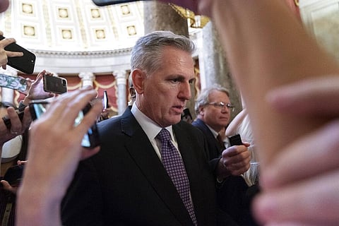 Rep. Kevin McCarthy, R-Calif., is surrounded by reporters as he walks to the House floor from the Speakers Office, Wednesday, Jan. 4, 2023, on Capitol Hill in Washington. (Photo | AP)