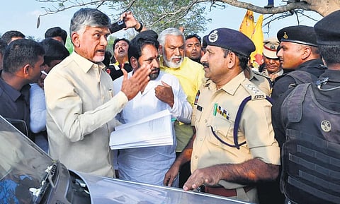 TDP chief Chandrababu Naidu arguing with police after they intercepted his convoy at Pedduru during his three-day Kuppam tour on Wednesday | Express