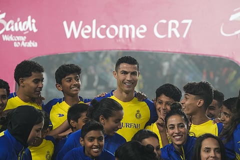 Cristiano Ronaldo smiles during his official unveiling as a new member of Al Nassr soccer club in in Riyadh, Saudi Arabia. (Photo | AP)