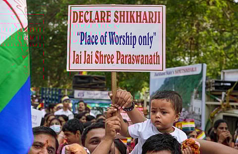 People belonging to Jain Community take part in a protest against the decision declaring Shri Sammed Shikharji a tourist place in Jharkhand, near Rajarathinam Stadium, in Chennai. (Photo | PTI)