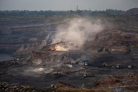 Excavation continues at an open-cast mine near Dhanbad, in Jharkhand, Sept. 24, 2021. (File Photo | AP)
