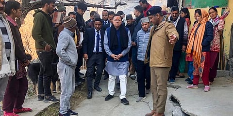 Uttarakhand Chief Minister Pushkar Singh Dhami inspects the landslide affected area of Joshimath. (Photo | PTI)