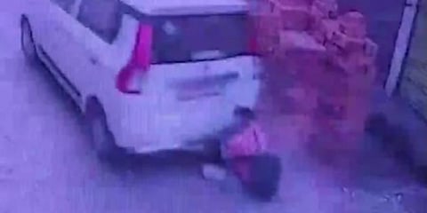 CCTV screengrab of Ketan Kumar being dragged by the car.
